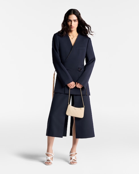 Easy Pouch On Strap Monogram Empreinte Leather in Women's Wallets and Small Leather Goods Wallets and Small Leather Goods for Women collections by Louis Vuitton