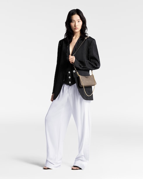 Easy Pouch On Strap Monogram Empreinte Leather in Women's Wallets and Small Leather Goods Wallets and Small Leather Goods for Women collections by Louis Vuitton