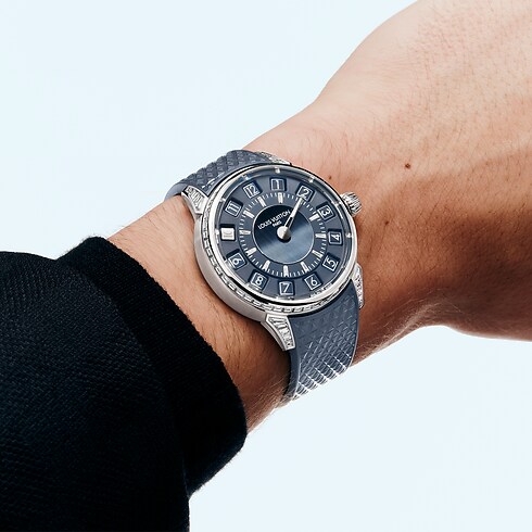 Tambour Spin Time, Automatic, 39.5mm, White gold, Hawk's eye and diamonds in Watches's All Watches } collections by Louis Vuitton (Product zoom)