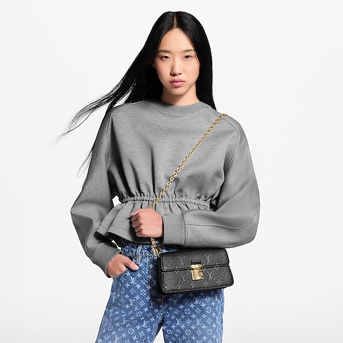 Wallet On Chain Métis Monogram Empreinte in Women's Wallets and Small Leather Goods Nano Bags and Chain Wallets collections by Louis Vuitton (Product zoom)